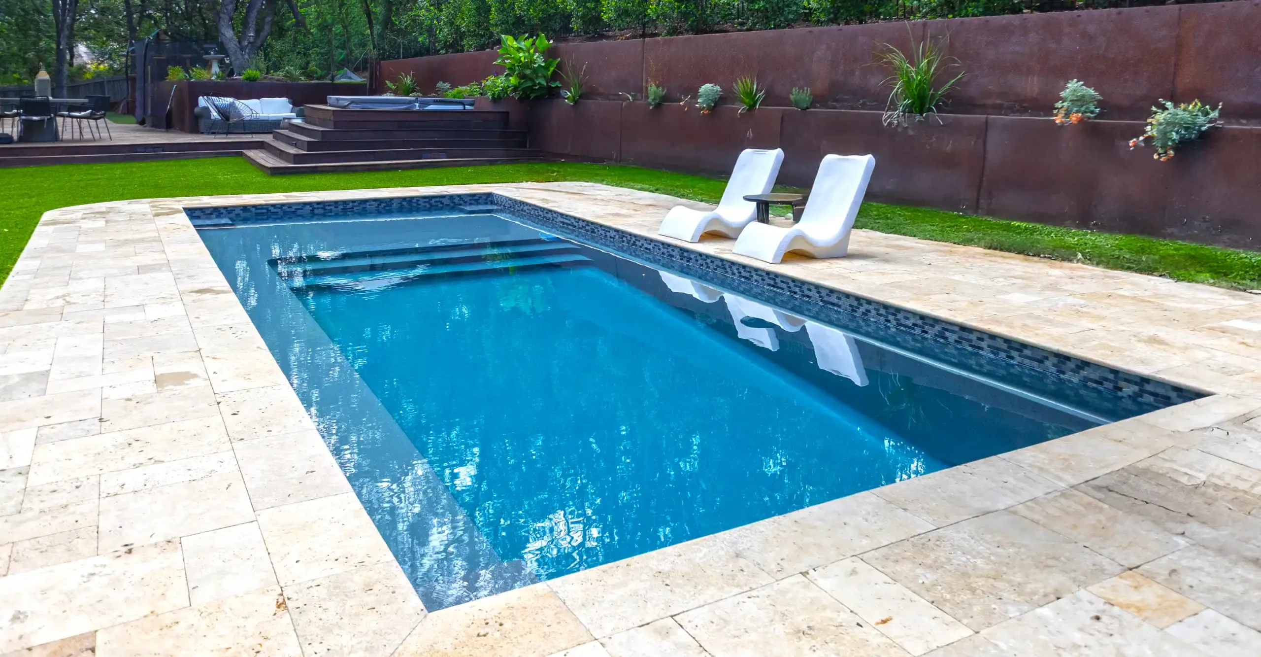 The Ovation fiberglass pool design by Aviva Pools